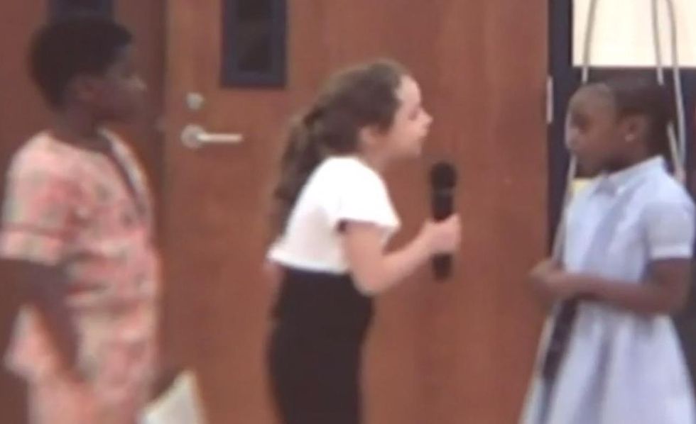 White girl, 7, portrays racist in school play. Furious parents had no idea until she was onstage.