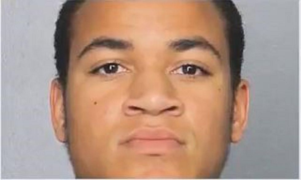 Florida massacre suspect's brother charged with trespassing - at same school of killings