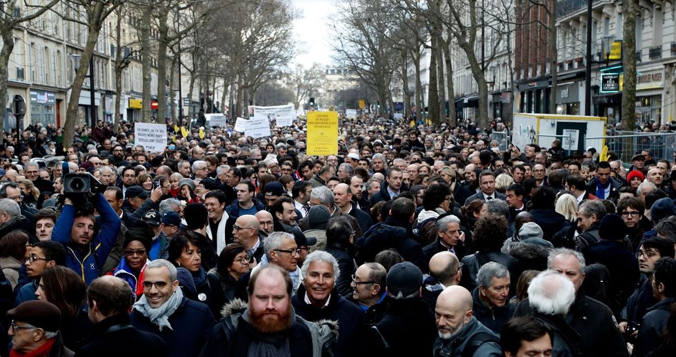 Thousands march in protest after Holocaust survivor stabbed, set on fire in gruesome Paris murder