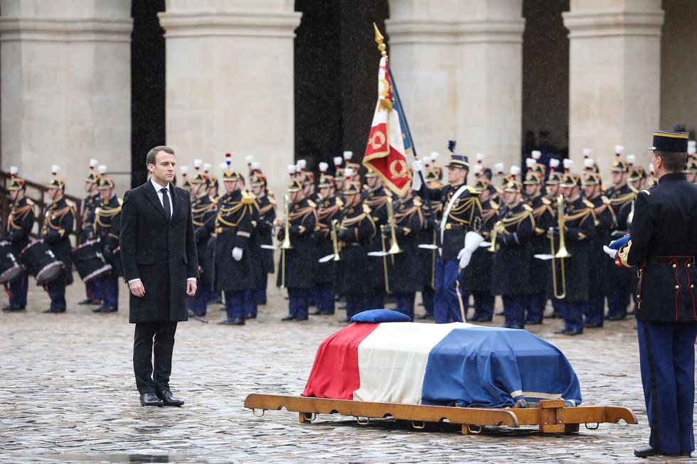 French president honors hero police officer who died in Friday’s terror attack