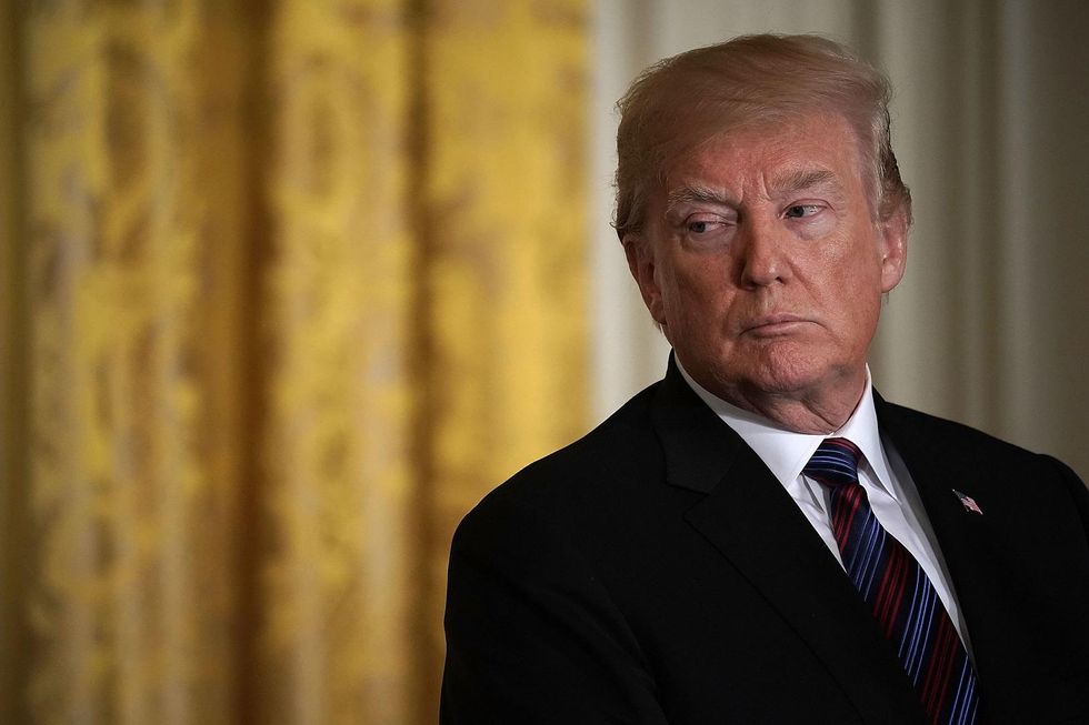 Trump says military will be used to secure border until a wall can be built