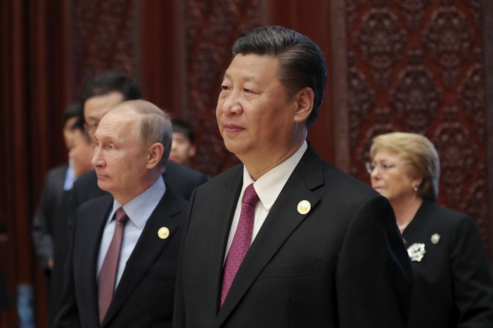 China announces military alliance with Russia to 'show Americans