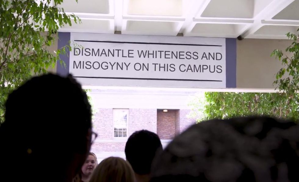 Dismantle Whiteness' mural installed outside college journalism building aims to 'spark dialogue