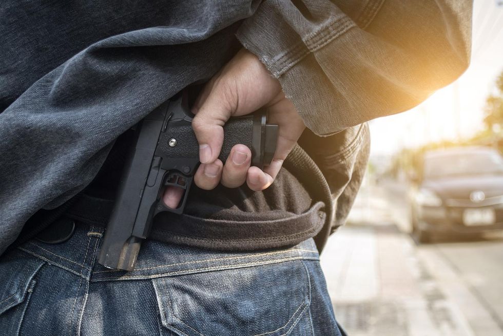 Man with hatchet threatens Arizona woman packing heat. It does not end well for the man.