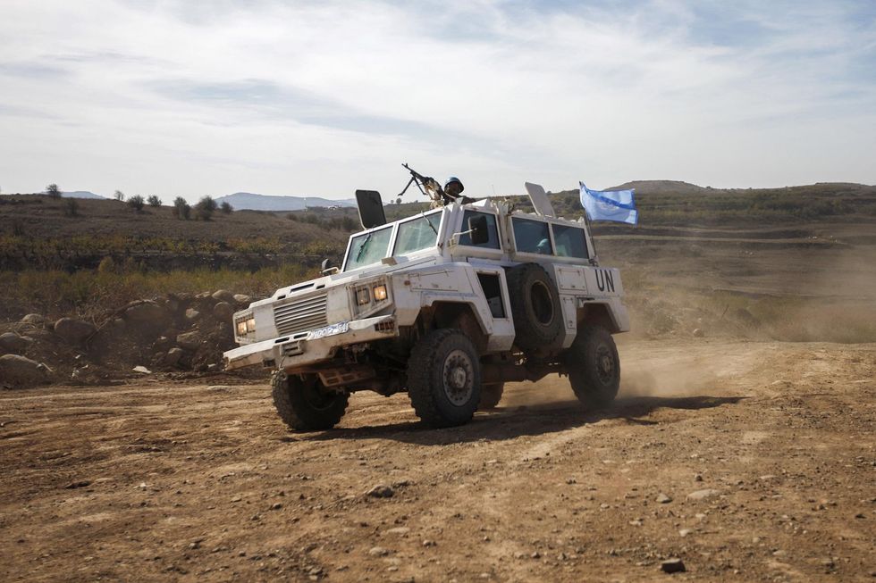 United Nations security team shot at in journey to chemical attack site