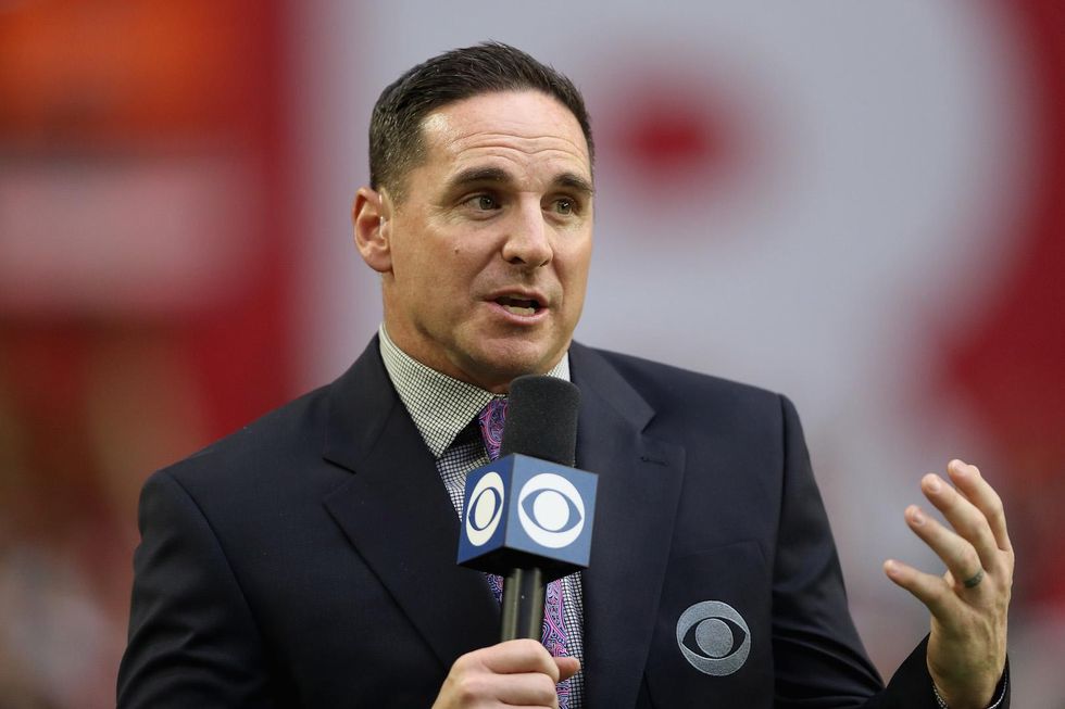 NFL analyst apologizes after backlash from this photo of him holding a gun