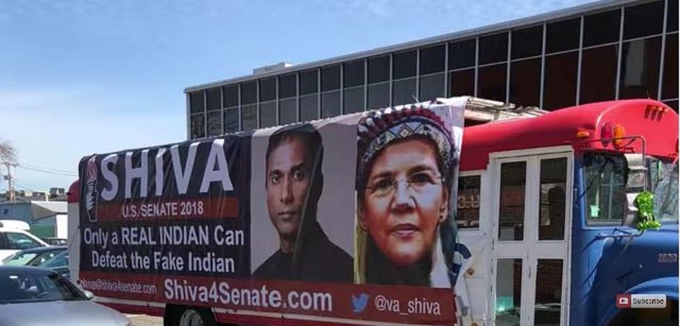 Real Indian' taking on Elizabeth Warren told to remove sign calling her 'fake Indian.' He's suing.
