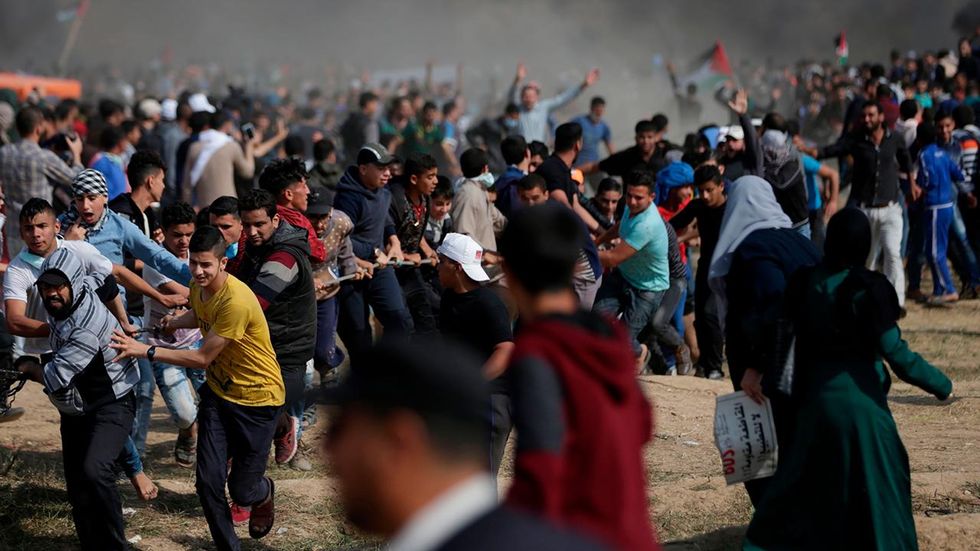 Israeli troops kill three protesters, injure 600 during 'riots' along Gaza border