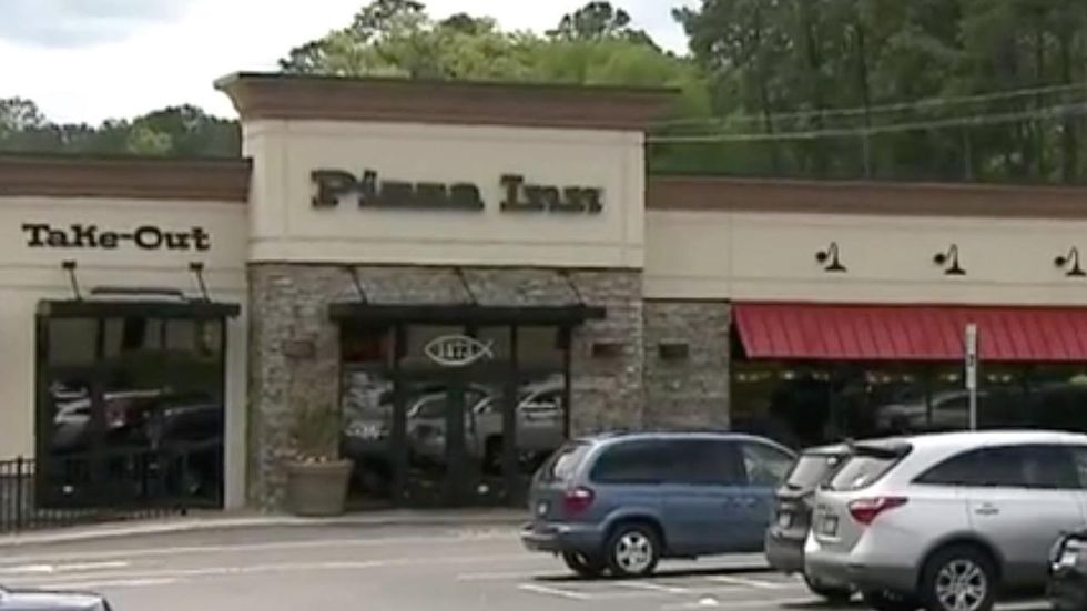 Pizza restaurant accused of racism for refusing coupon from black man
