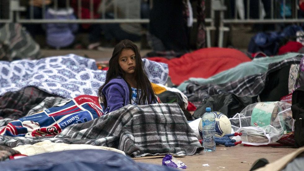 Border Patrol admits eight members of migrant 'caravan' for asylum interviews; 11 others arrested