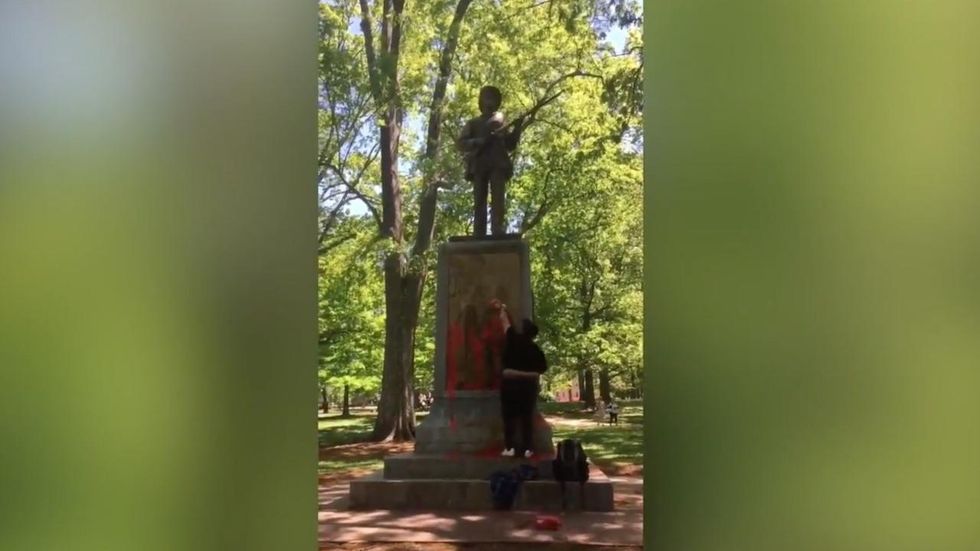 Woman livestreams vandalism of UNC's Silent Sam Confederate monument with her own blood