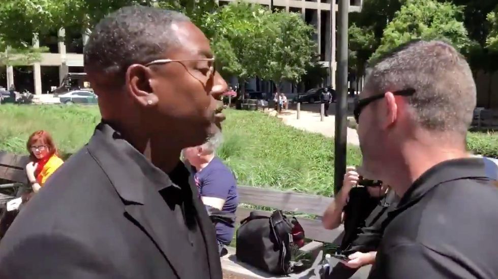 NRA member asks Alyssa Milano's security if they're armed at anti-gun rally. Watch the response.