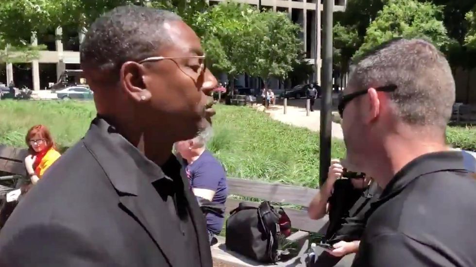 NRA member asks Alyssa Milano's security if they're armed at anti-gun rally. Watch the response.