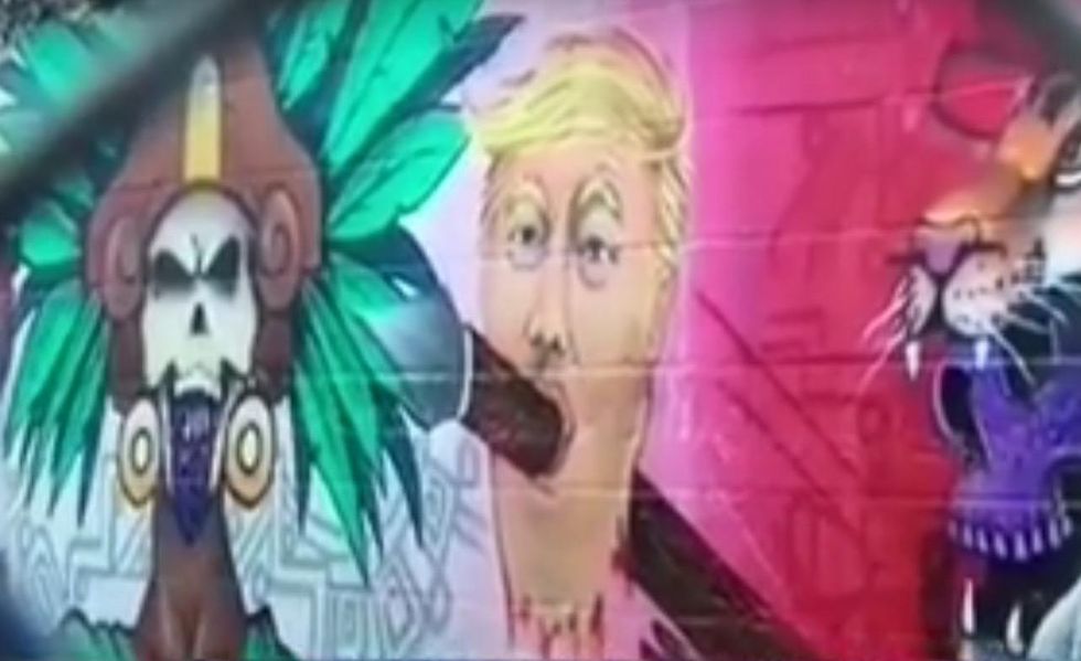 School mural depicts Trump's bloody, severed head rammed through with spear—and backlash is intense