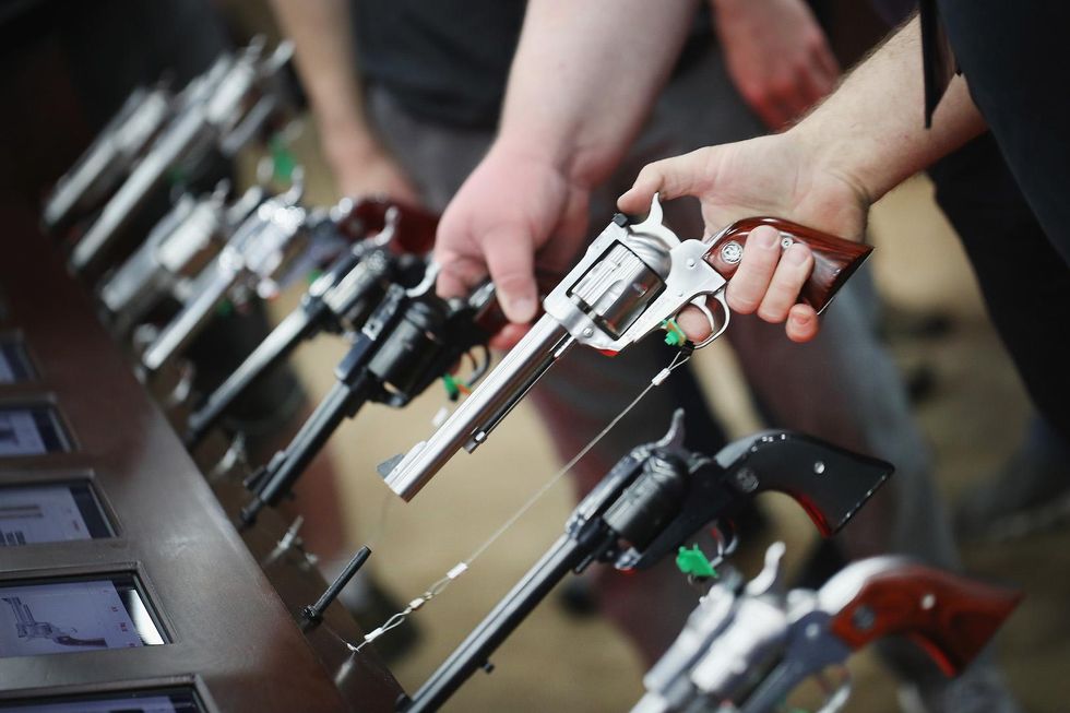 Investors attempt to pressure gun manufacturer over NRA ties, guns safety