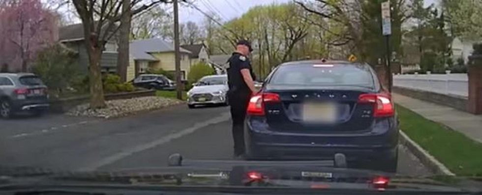 You guys hurt black people': School board member called to resign after berating police officer
