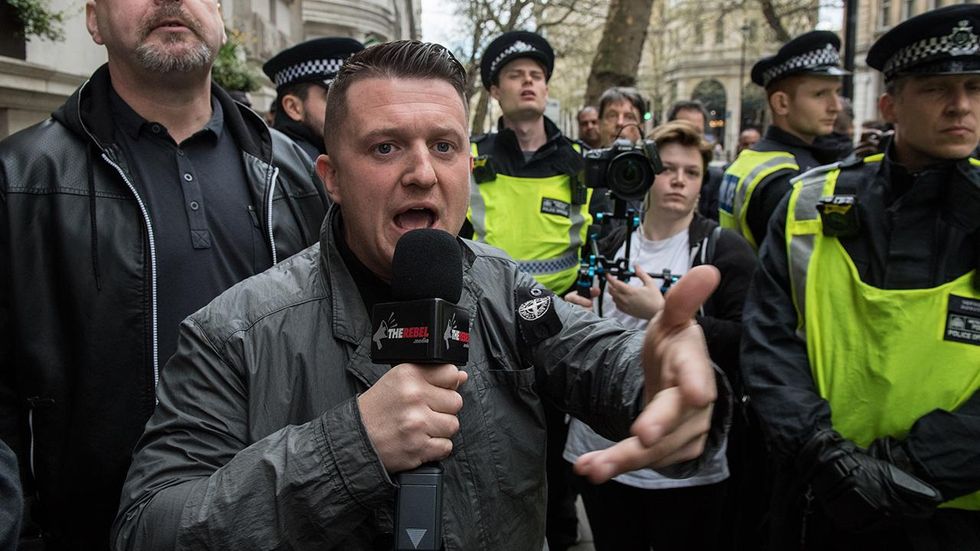 Hundreds of demonstrators protest arrest of right-wing activist Tommy Robinson