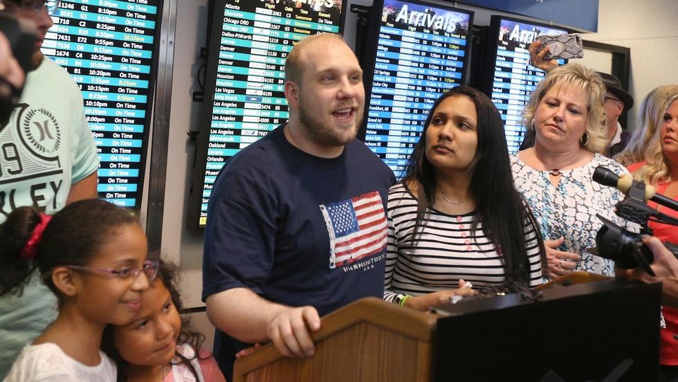 American Josh Holt returns home after serving two years in Venezuelan prison for alleged conspiracy