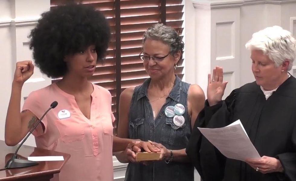 Progressive wins local election by 13 votes, takes oath upon 'The Autobiography of Malcolm X