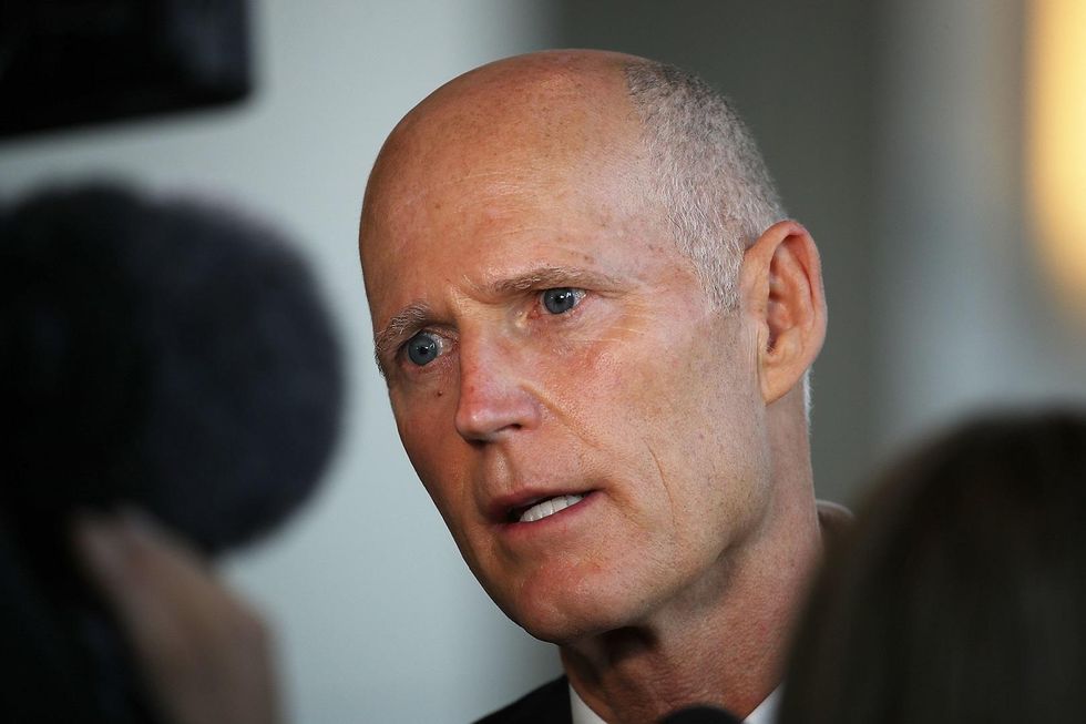 FL-Sen: Major Democratic donor drags Rick Scott to court one month before primary election