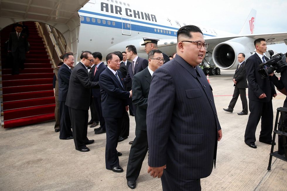 Kim Jong Un arrives in Singapore to cheers — and with his own toilet