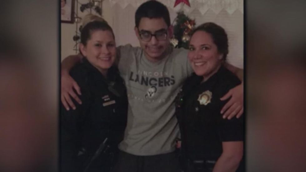 Police officers create special bond with bullied vision-impaired teen