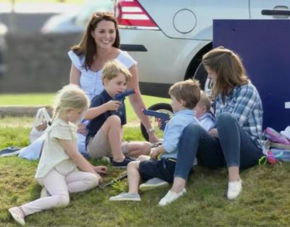Photos of Prince George playing with a toy gun have caused debate. Here's what the experts say.