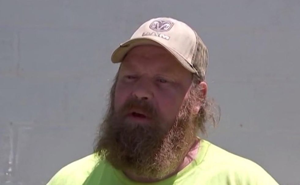 He hears gunshot in Walmart where his wife works. So he rushes inside and faces down the crooks.