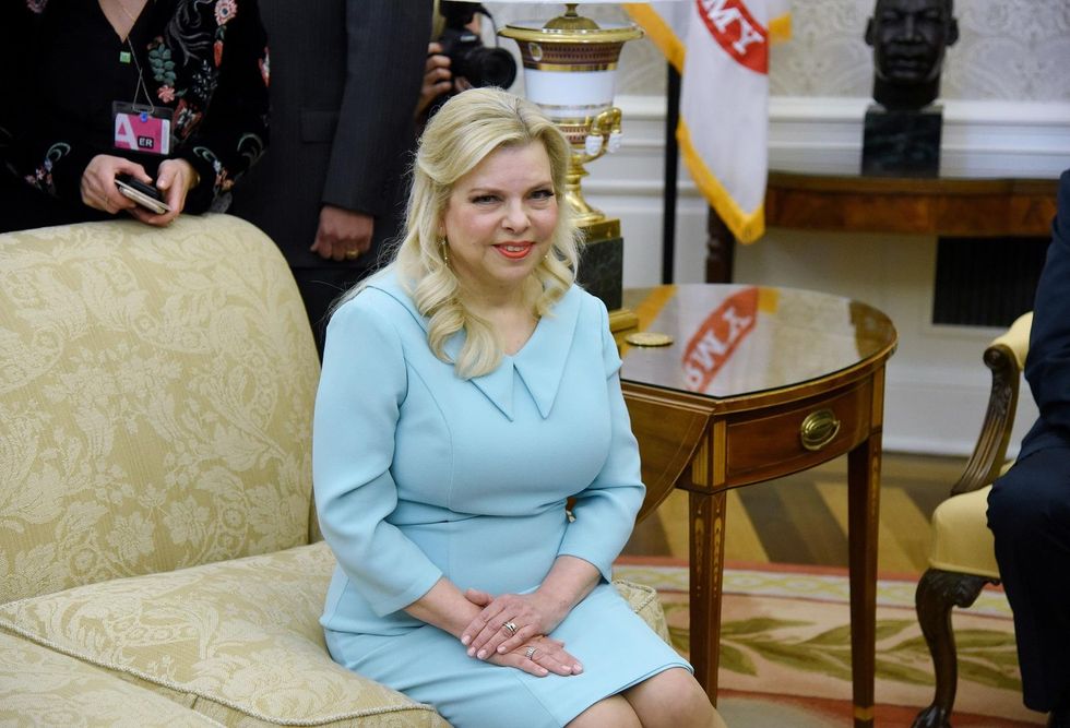 Israeli prime minister's wife charged with misusing government funds