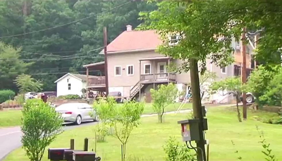 Intruder pours gas on home's floors. But homeowner fights back — and uses his gun for good measure.