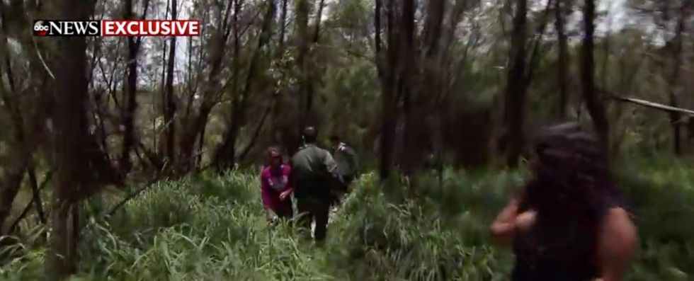 Look, there's a smuggler': Video shows firsthand how illegal immigrants are crossing into the US