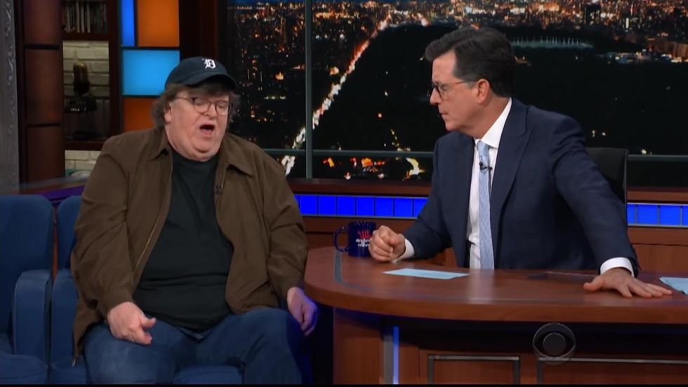 Michael Moore says liberals need to 'put our bodies on the line' against Trump