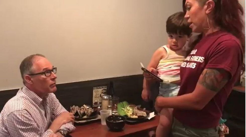 Watch: EPA chief Pruitt scolded while in restaurant, told to resign by teacher holding her toddler
