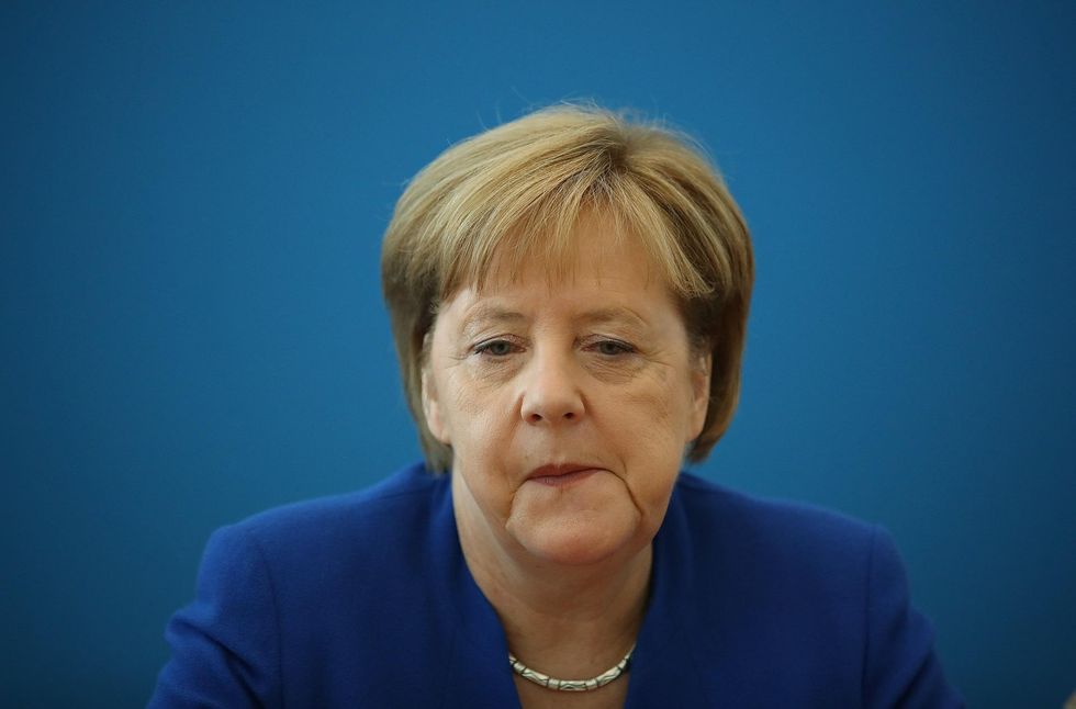 Merkel gives in: German chancellor agrees to tighten immigration policies