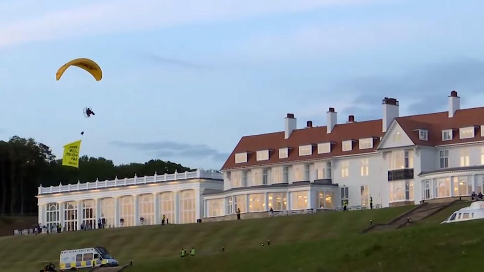 Police searching for paraglider who sailed over no-fly zone at Trump resort during Scotland protest