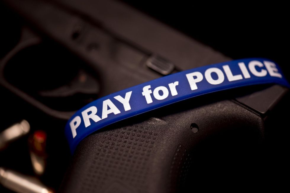 Cops see boy running around park in socks with bloody foot. What they do next will warm your heart.