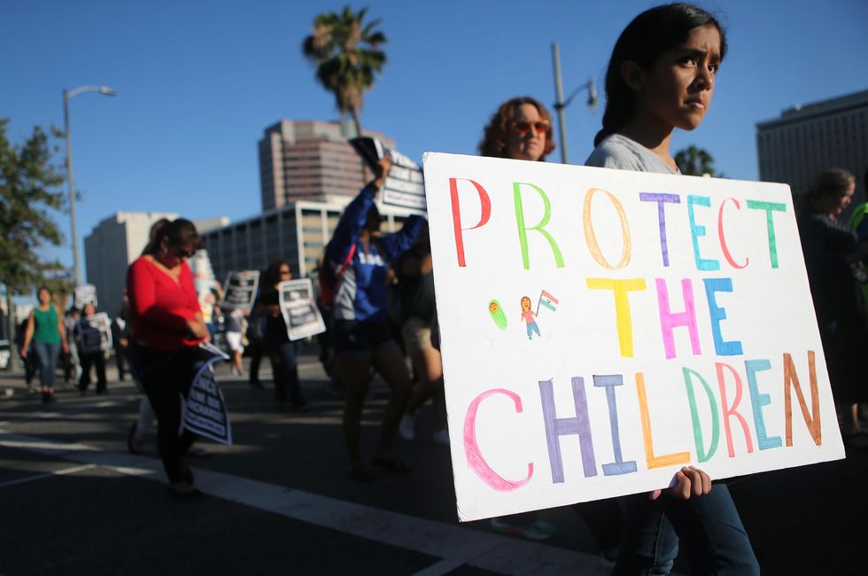 Federal judge orders government to stop deporting recently reunited immigrant families. Here's why.