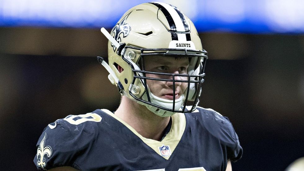 Hero NFL player rips car door off hinges to rescue man inside after accident: 'I prayed with him