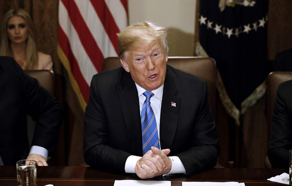 (UPDATED) Trump says Russia is no longer targeting the US with cyber attacks, contradicting his DNI