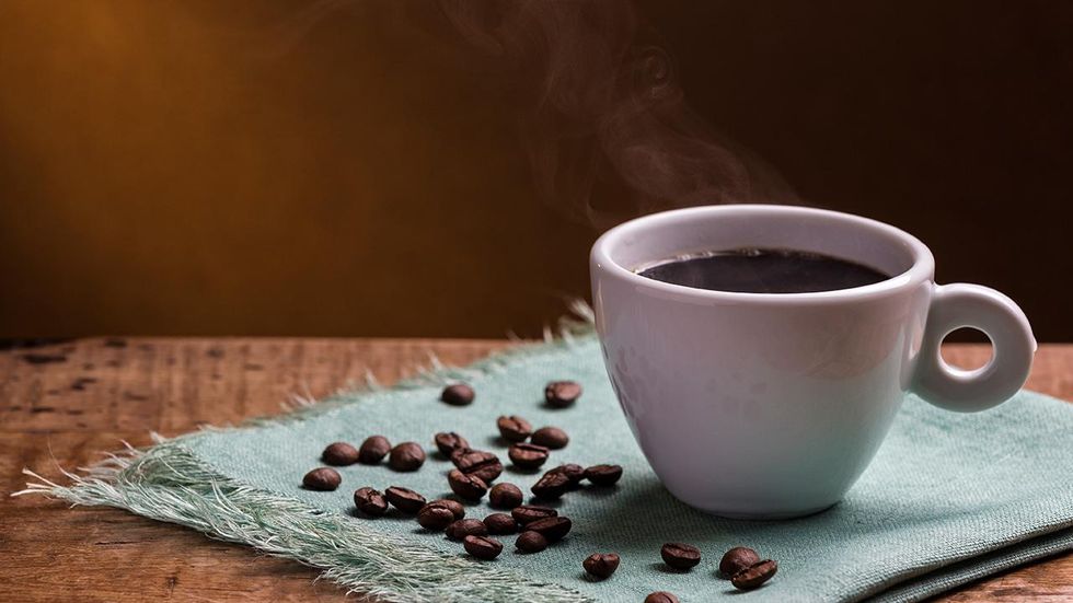 Shouting protesters throw feces at coffee shop because owner supports Trump's immigration stance