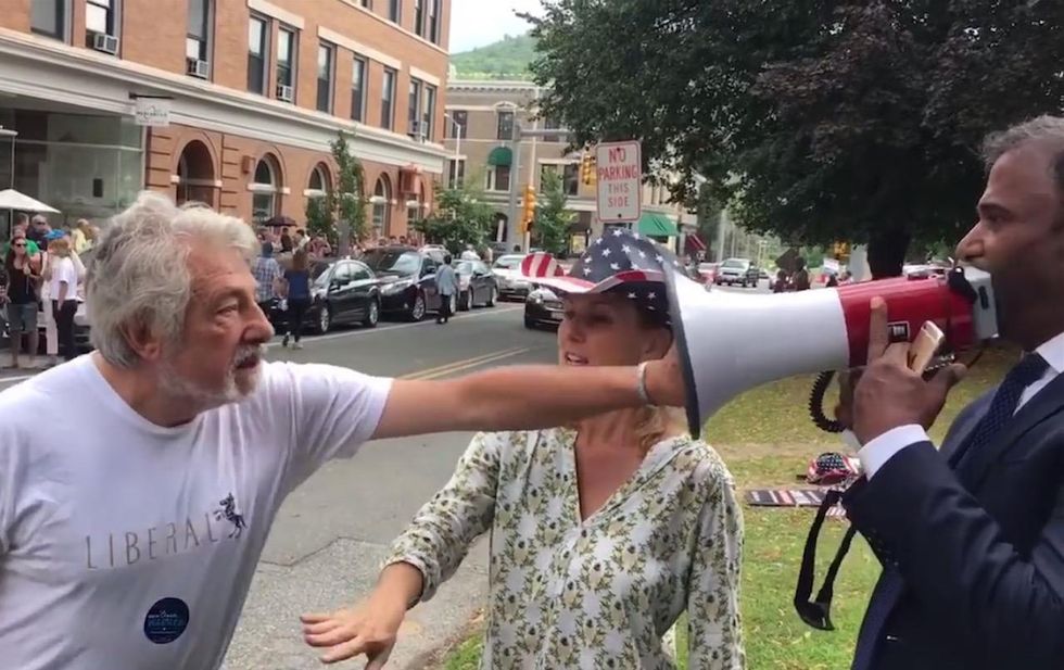 Man in 'Liberal' T-shirt shoves bullhorn in face of candidate from India opposing Elizabeth Warren