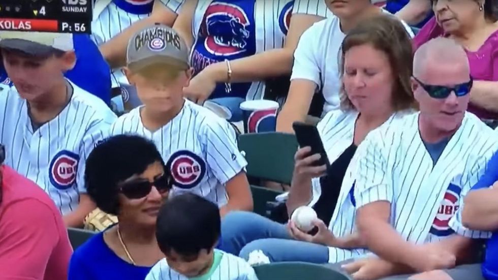 Video sparks outrage after man takes kid's baseball at Cubs game — but all is not what it seems
