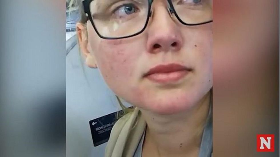 Watch: Activist holds up plane departure in protest to prevent the deportation of an asylum-seeker