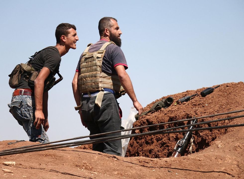 Dozens dead in string of ISIS attacks in Syria