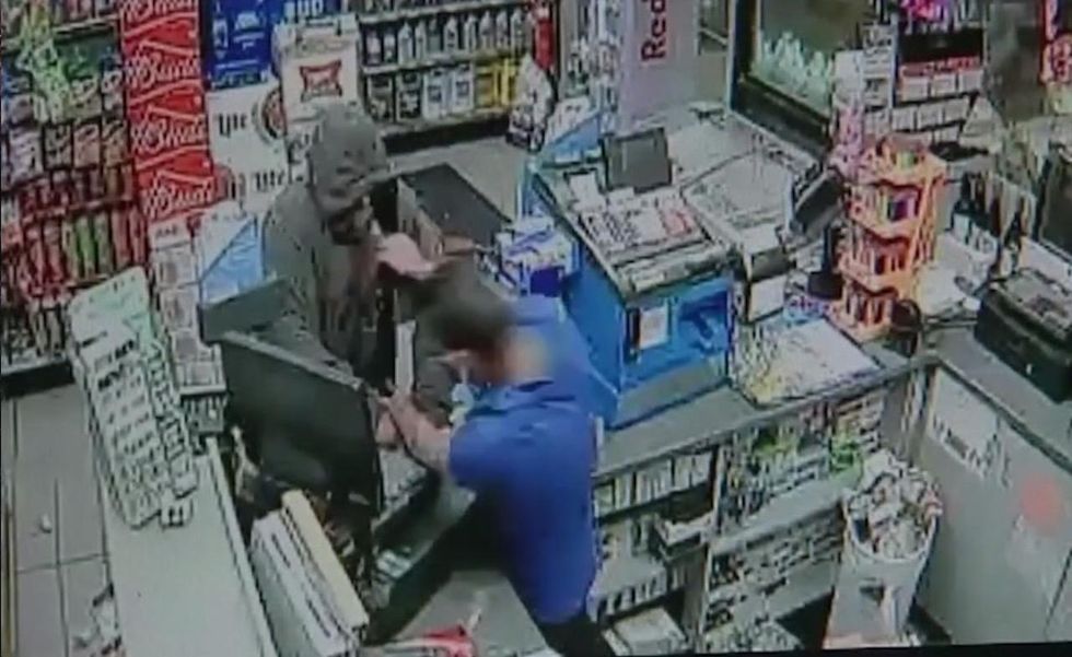 Crook tries stealing cash from register. But 120-pound clerk—trained in martial arts—isn't playing.