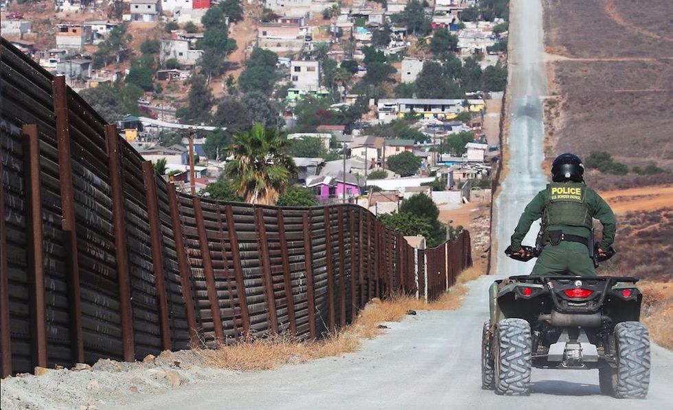 Man steals Border Patrol ATV after knocking agent off it with rock. So agents pull out their guns.