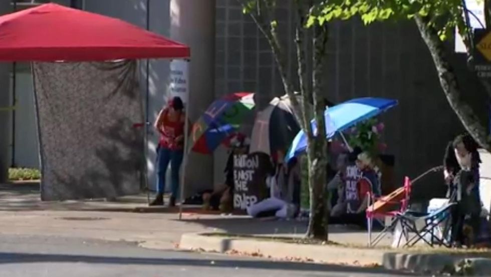 Demonstrators block entrances at Nashville prison headquarters to 'defend families' from ICE
