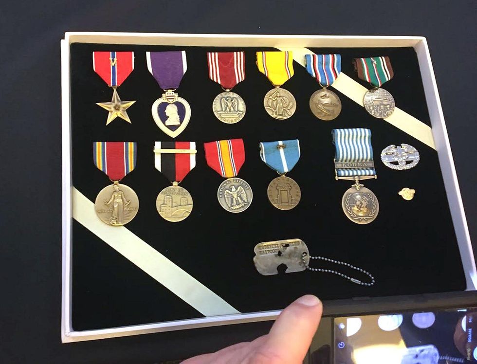 Sons of Korean War medic missing since 1950 get his dog tag in shipment of bones from North Korea