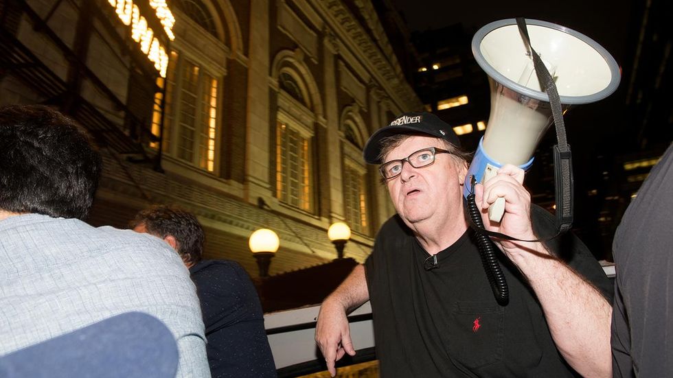 Trailer, review of filmmaker Michael Moore's 'Fahrenheit 11/9' fans flames of division in nation