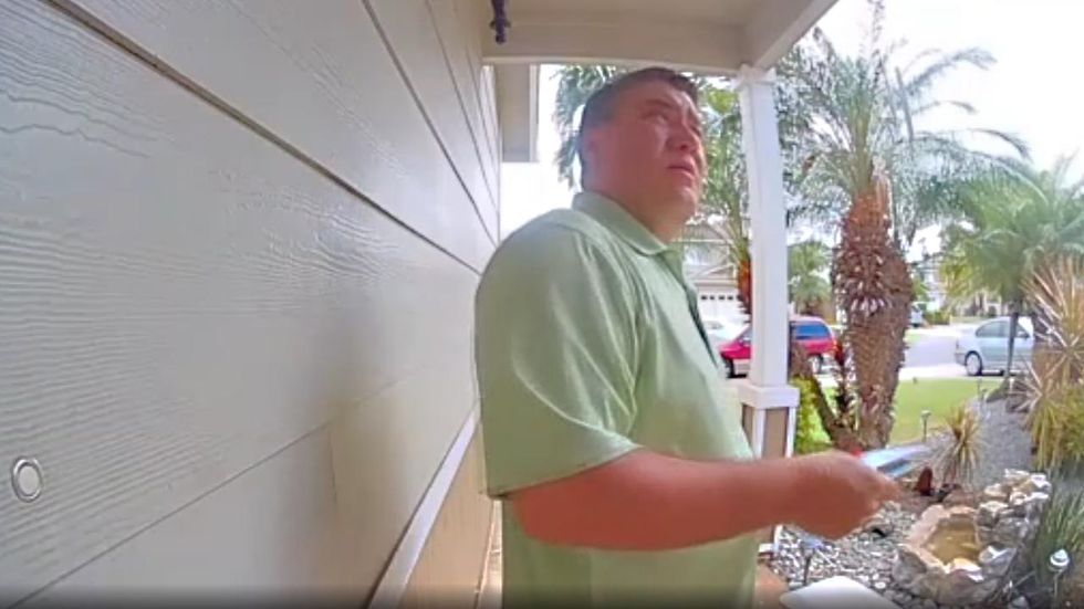 Surveillance camera shows Hawaii State Senate hopeful, a Democrat, stealing opponent's flyer